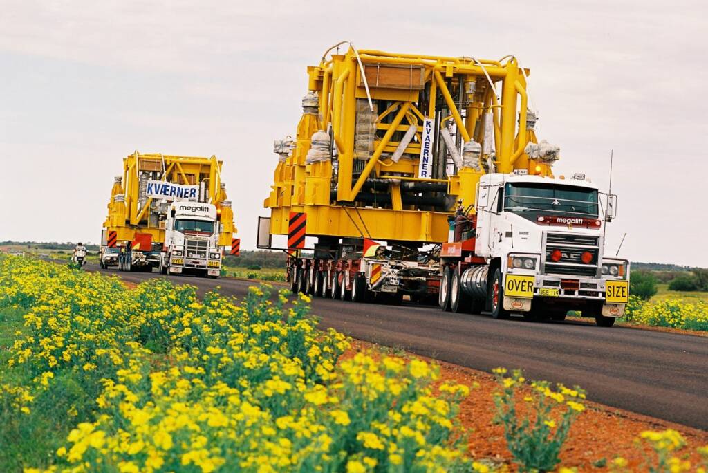 Road Trains (150 tonne oil rigs), Central Australia © Hans Boessum