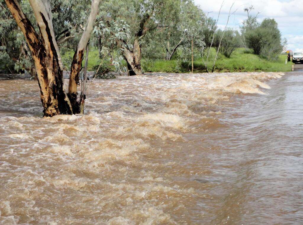 Roe Creek flowing over Larapinta Drive, Alice Springs, 19 Mar 2011