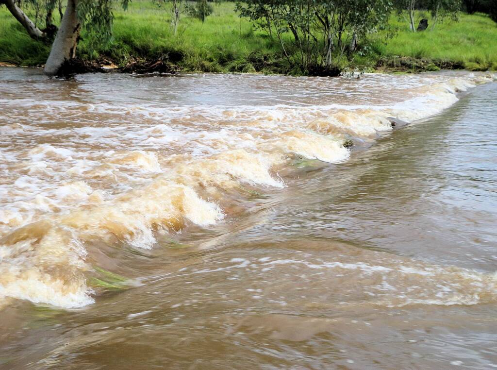 Roe Creek flowing over Darken Road, Simpsons Gap, 19 Mar 2011