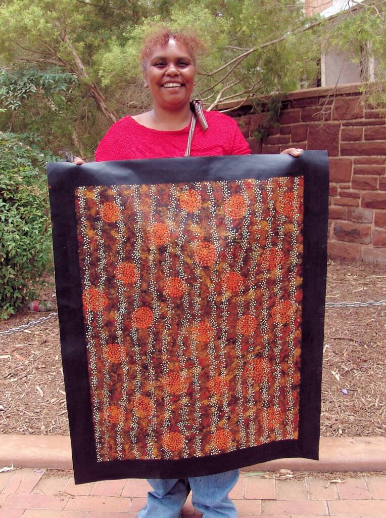 Trephina (with her beautiful smile) holding Minga, 2008 © Trephina Sultan Thanguwa