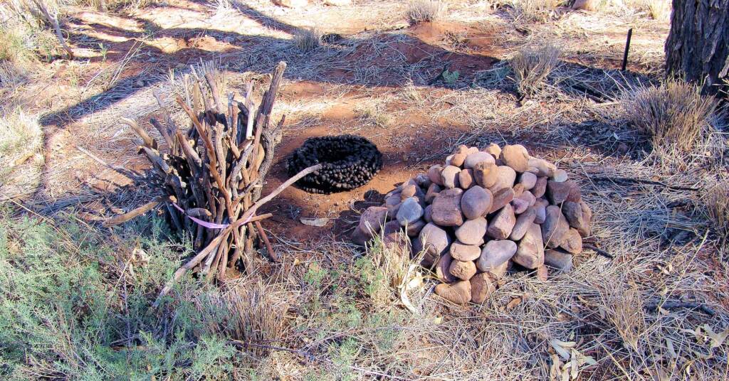 A Pile of Stones, A Bundle of Sticks & Black Gold, Artist Sue Taylor - (stones, sticks, roo poo and string)