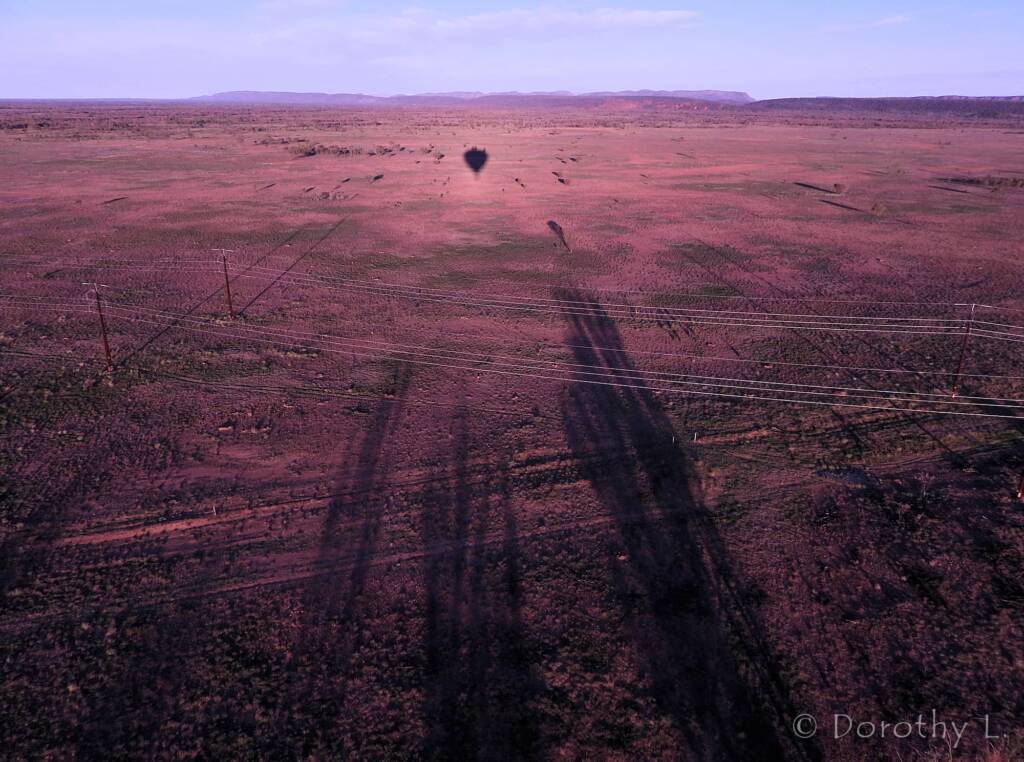 Fingers reaching for the balloon, Central Australia