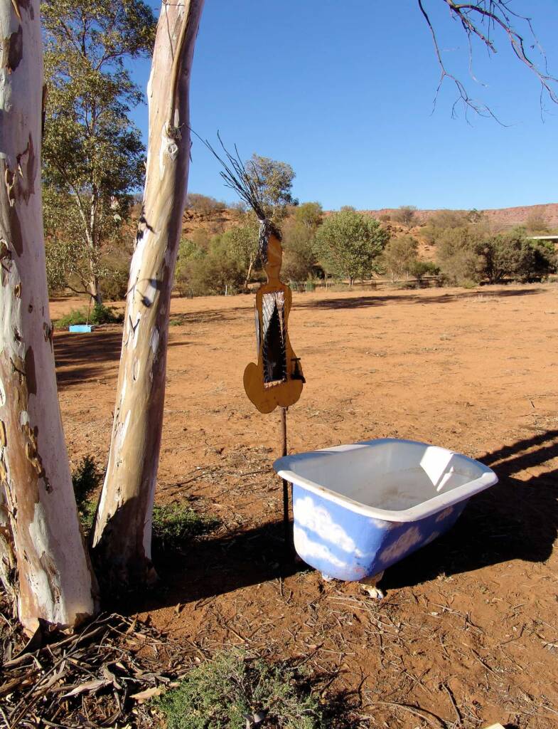 Songline II) Water Stories - Artist Al Bethune - (bonnet cut-out, story wires, aluminium power line, solar panel copper, bath)