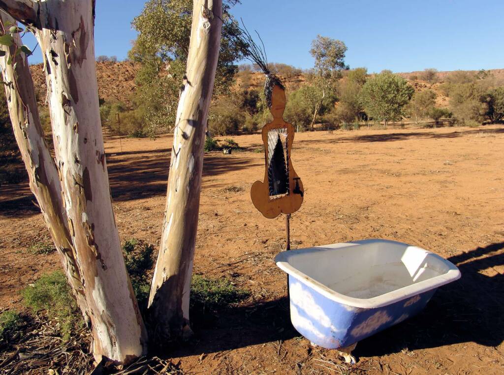 Songline II) Water Stories - Artist Al Bethune - (bonnet cut-out, story wires, aluminium power line, solar panel copper, bath)