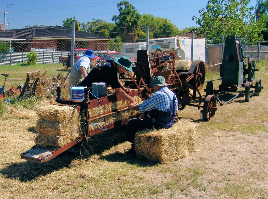 Polyester twine was not available when this bale maker was first used, Kyabram Engine Rally (2006)