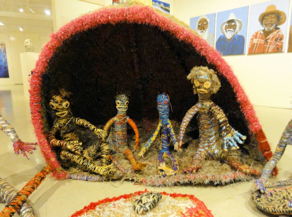 Pitja nyawa kulila (Early days family) by Tjanpi Desert Weavers