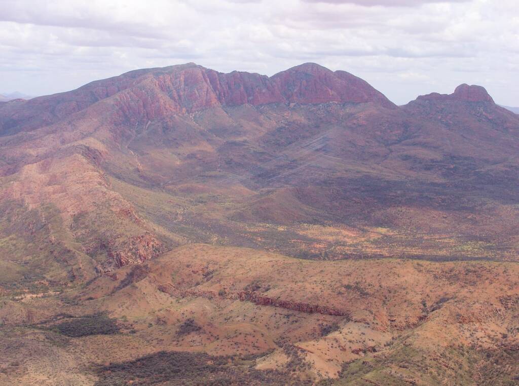 Helicopter ride on a cloudy day over Mount Sonder, West MacDonnell Range