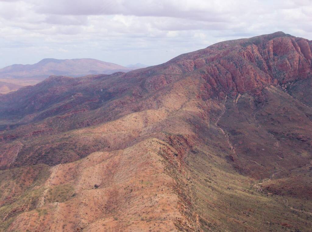 Helicopter ride on a cloudy day over Mount Sonder, West MacDonnell Range