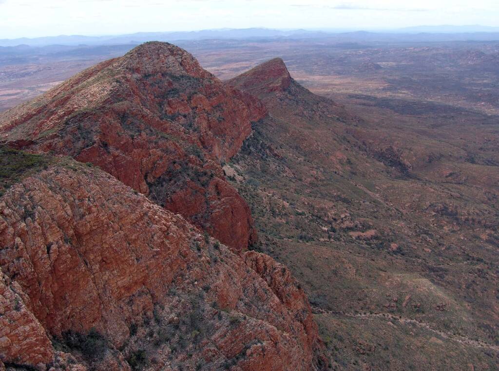 Helicopter ride on a cloudy day over Mount Sonder, West MacDonnell Range