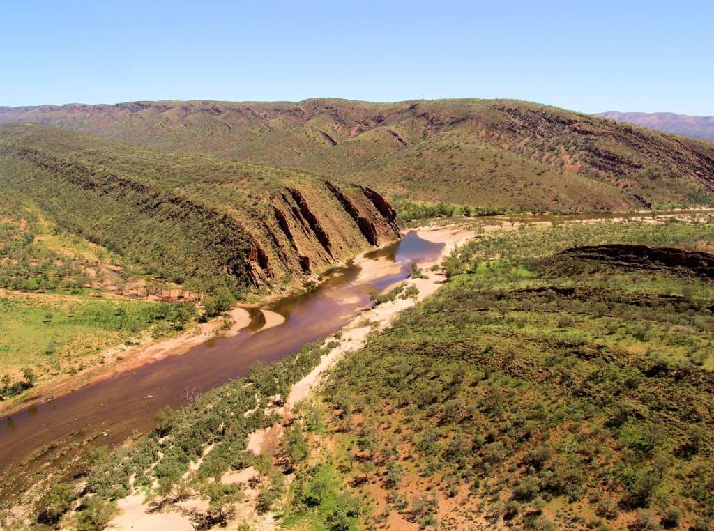 Helicopter is a great way to view the landscape, as we look down on the Finke River and the West MacDonnell Range, south of Glen Helen.