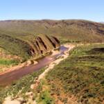Helicopter is a great way to view the landscape, as we look down on the Finke River and the West MacDonnell Range, south of Glen Helen.