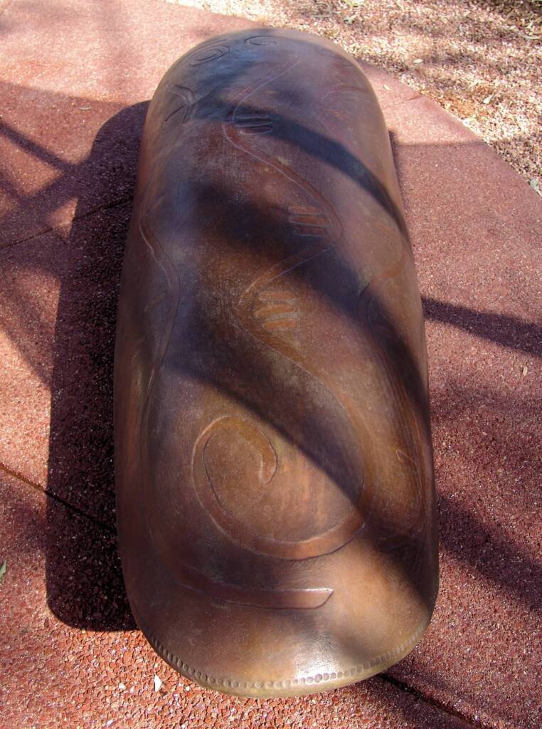 Coolamon - Walpiri language: Nyinakalu - Translation: 'come, sit, be'