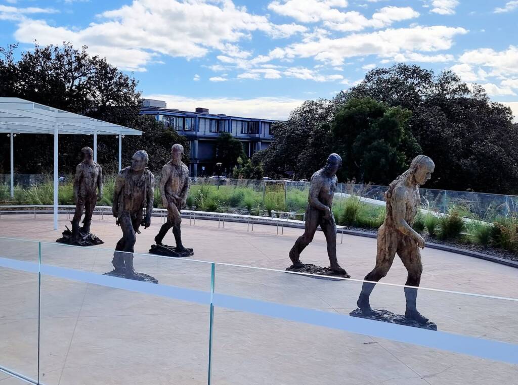 Walking men 2018-22, bronze (on loan from the Nock Art Foundation), artist Laurence Edwards (England b1967)