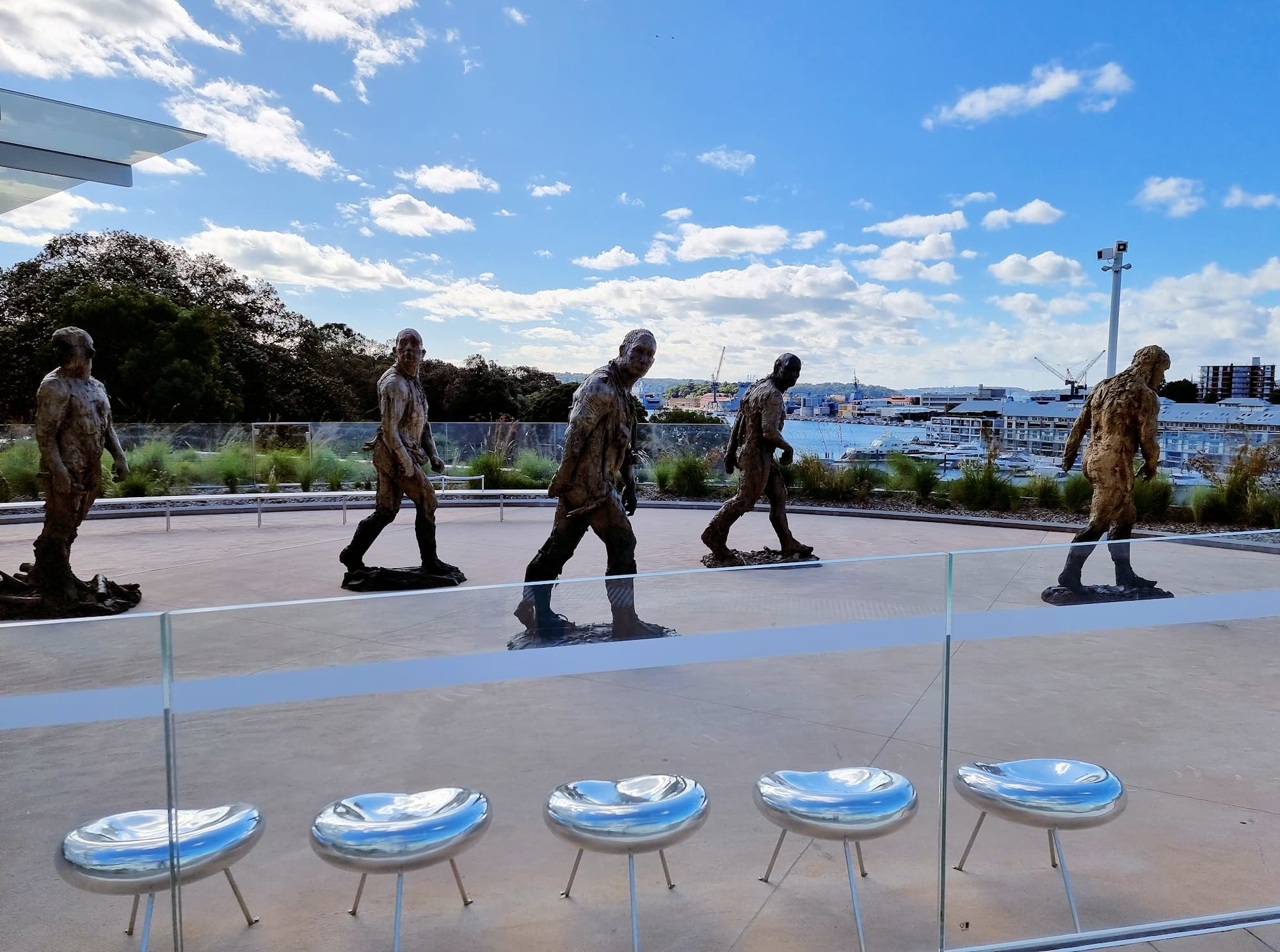 Walking men 2018-22, bronze (on loan from the Nock Art Foundation), artist Laurence Edwards (England b1967)