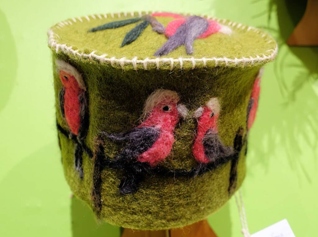 Galahs sitting on fence by Nita Ferguson, Tapatjatjaka Art Centre, Titjikala NT, Alice Springs Beanie Festival 2023