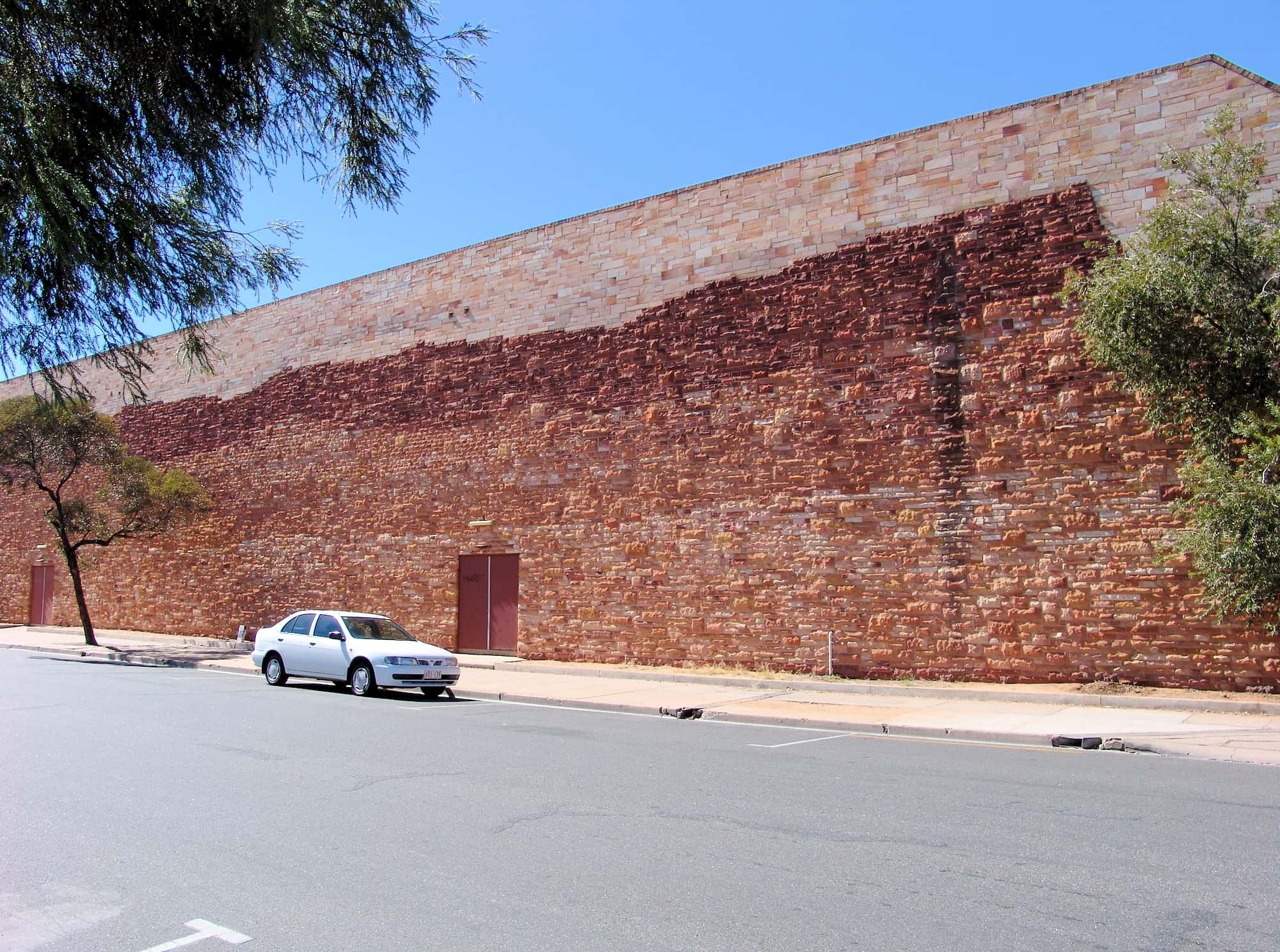 1984 Sandstone Mural (Kmart Mural) by John Newman (stonemason), Alice Springs NT
