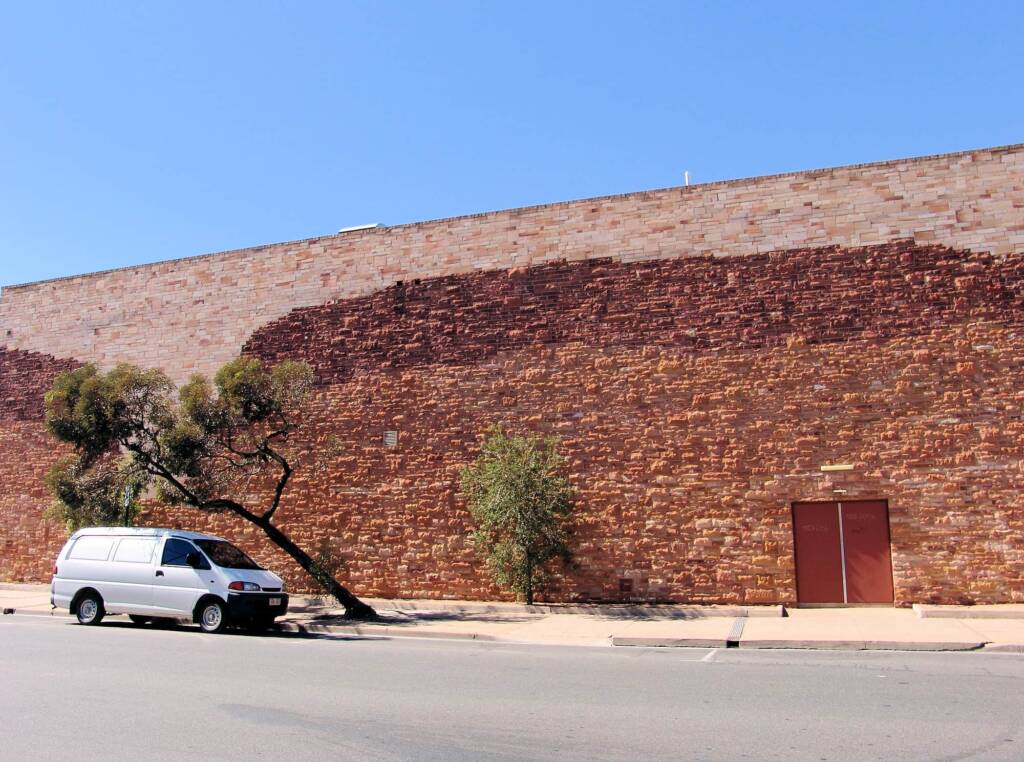 1984 Sandstone Mural (Kmart Mural) by John Newman (stonemason), Alice Springs NT