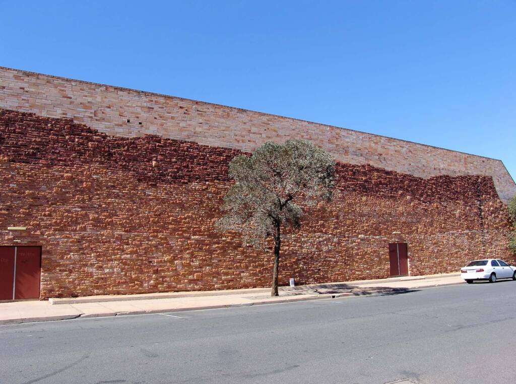 1984 Sandstone Mural (Kmart Mural) by John Newman (stonemason), Alice Springs NT