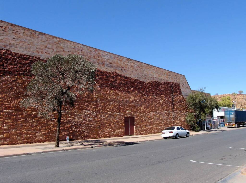1984 Sandstone Mural (Kmart Mural) by John Newman (stonemason), Alice Springs NT
