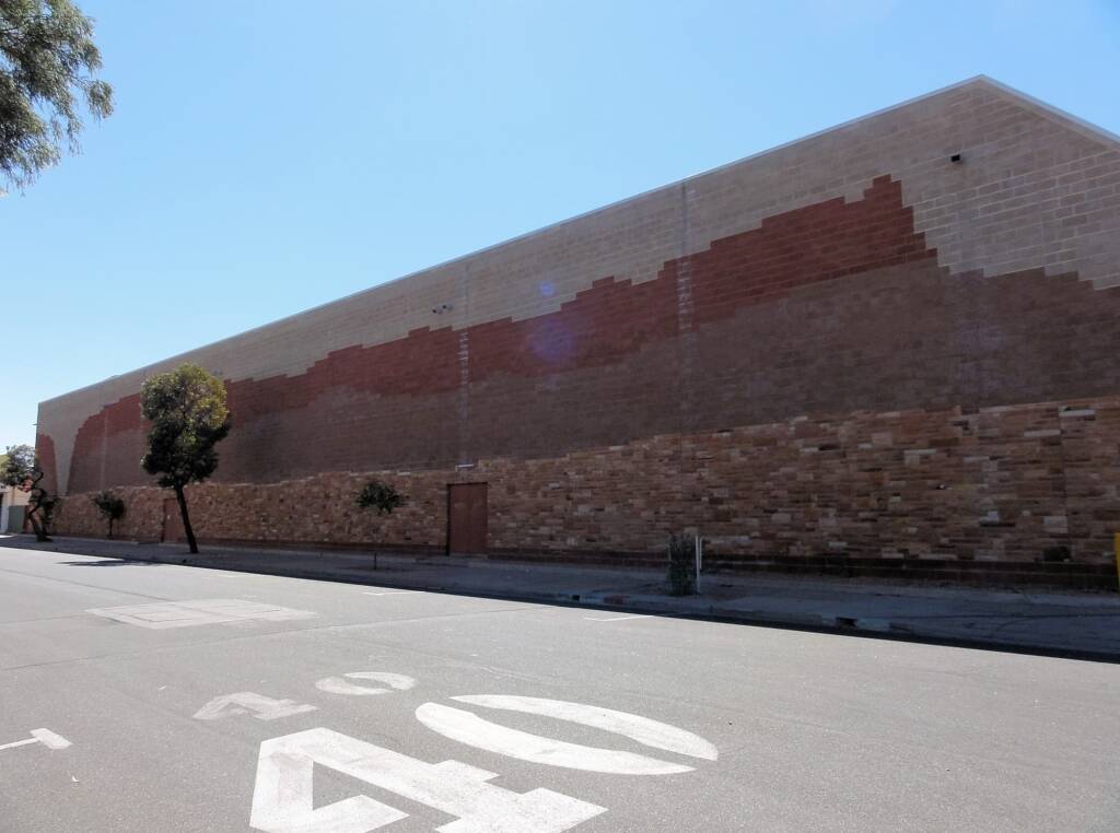 Sandstone Mural (Kmart Mural) by John Walker and Peter Bakurski, Alice Springs NT