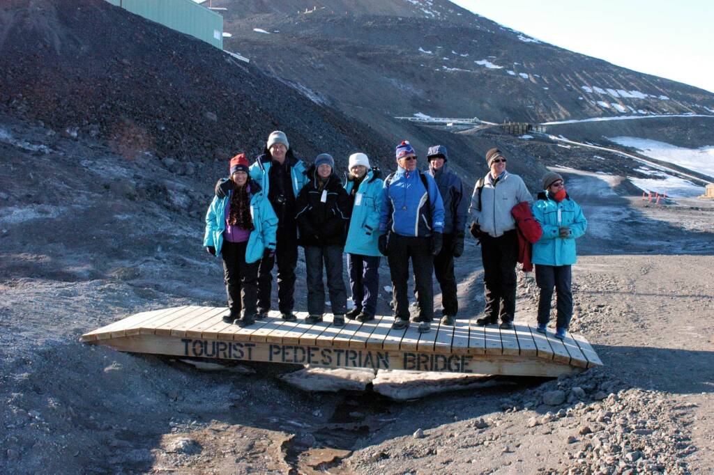 Fellow travellers standing on the 'Tourist Pedestrian Bridge', Antarctic © Jennifer Cooke