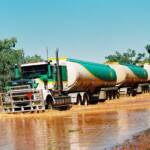 BP Road Train (through flooded river creek), Central Australia © Hans Boessum