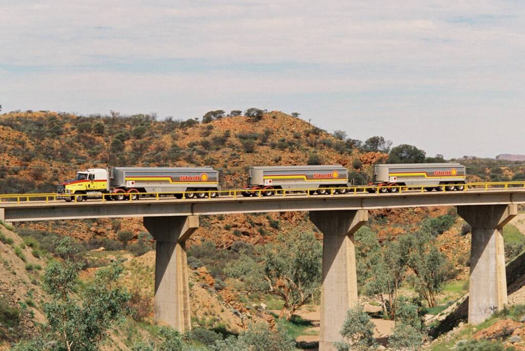 Road train on the Stuart Highway Bridge over the Charles River (north of Alice Springs), Central Australia © Hans Boessum