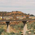 Road train on the Stuart Highway Bridge over the Charles River (north of Alice Springs), Central Australia © Hans Boessum