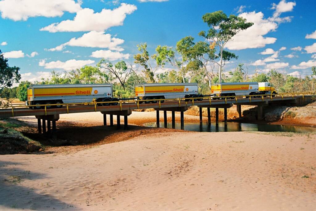 Shell Road Train (on bridge over sandy river bed) © Hans Boessum