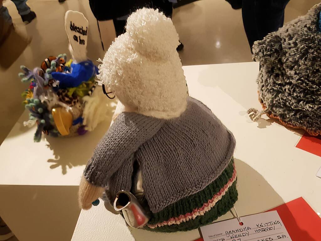 Grandma Knitting by Wendy Harvey, Mawson Lakes SA - Alice Springs Beanie Festival 2024