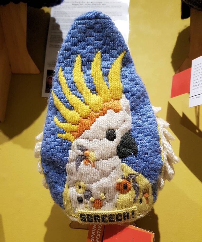 "Hello Cocky!", by Debbie Petersen, Tantawangalo Candelo NSW - Alice Springs Beanie Festival 2024