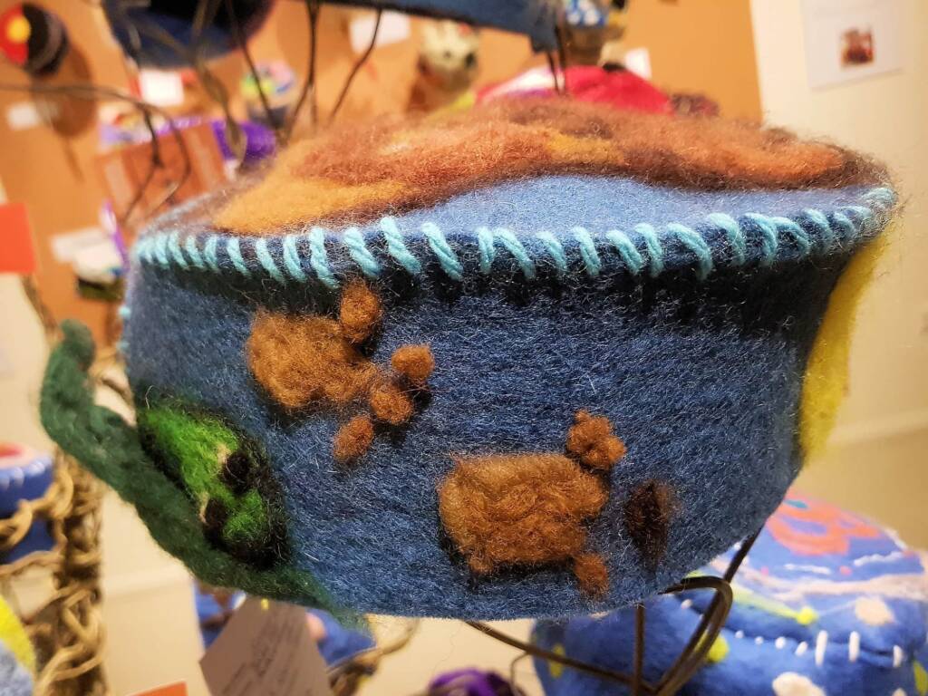 Sunset Snuggles, by Jake Cole and Jeltro Baker-Neeft - Alice Springs Beanie Festival 2024