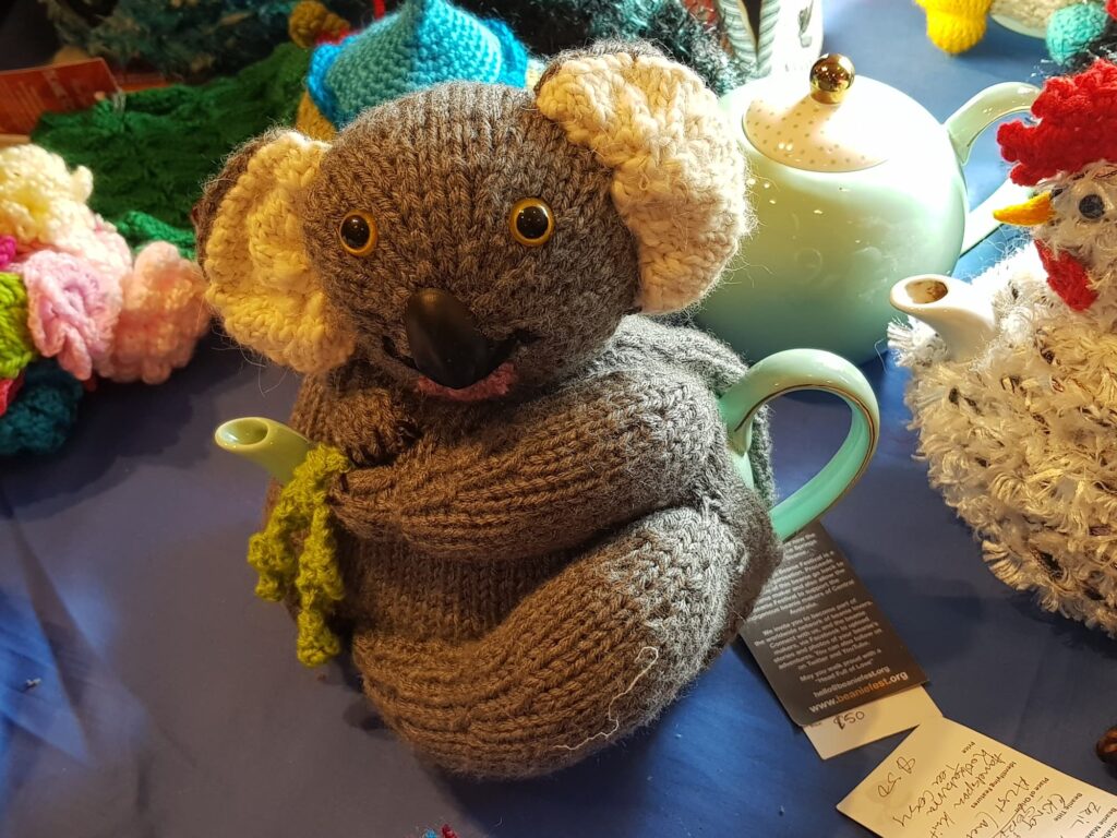 Kenny Koala (tea cosy) by Ros Aitchison, Brisbane QLD, Alice Springs Beanie Festival 2025