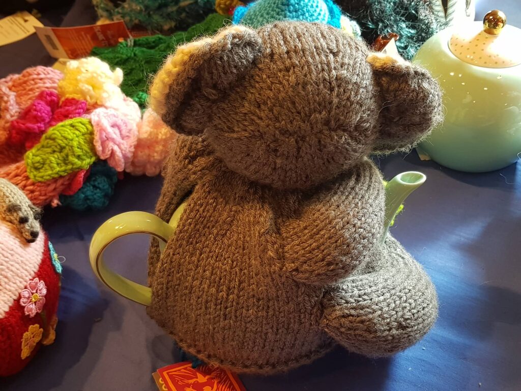 Kenny Koala (tea cosy) by Ros Aitchison, Brisbane QLD, Alice Springs Beanie Festival 2025