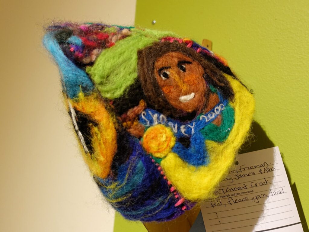 Cathy Freeman by Amy James and Alba Brocky (winner Favourite Sporting Legend), Alice Springs Beanie Festival 2025