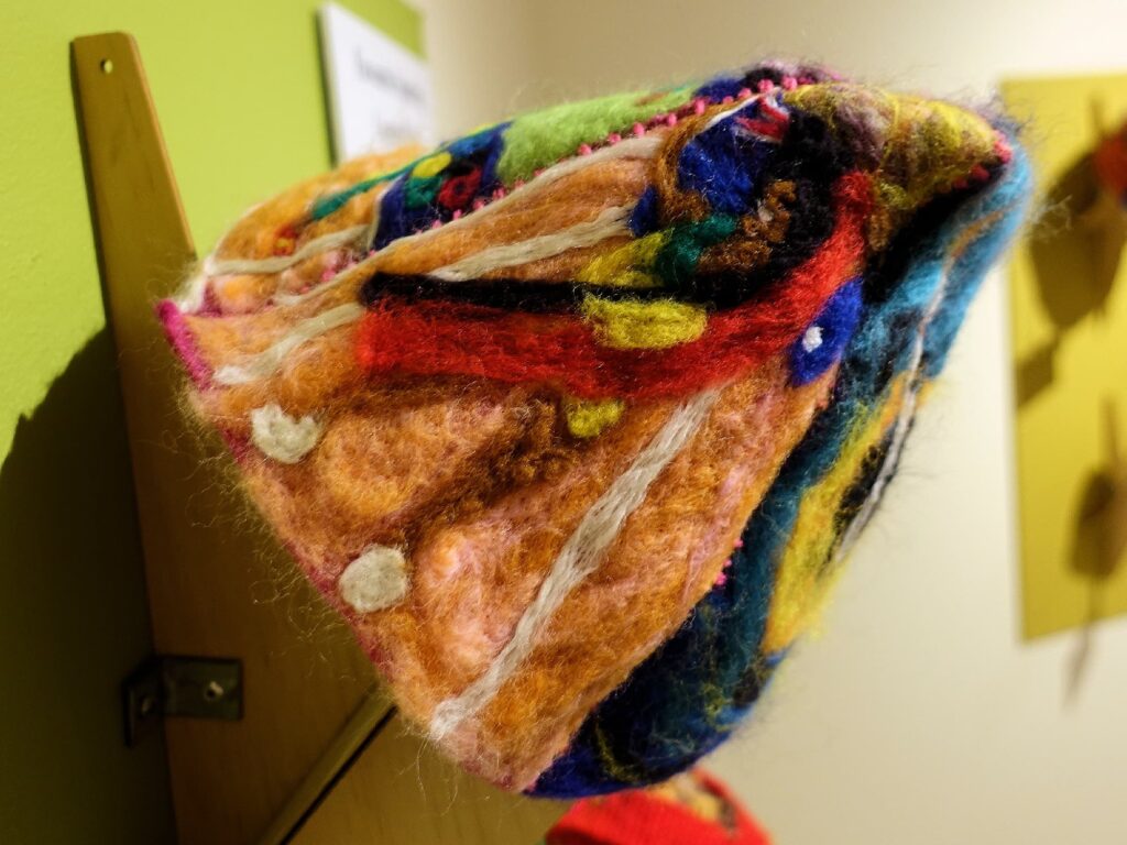 Cathy Freeman by Amy James and Alba Brocky (winner Favourite Sporting Legend), Alice Springs Beanie Festival 2025
