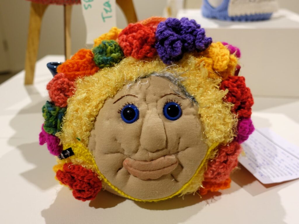 Nanna's bathing cap (tea cosy) by Barbara d'Arbon, Alice Springs Beanie Festival 2025