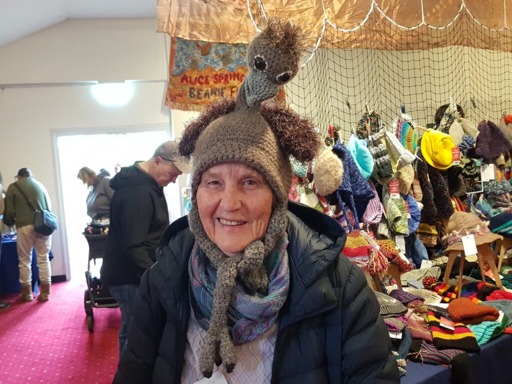 Emu beanie - wearer Jan, Alstonville, NSW at 2026 Alice Springs Beanie Festival - 30th Anniversary