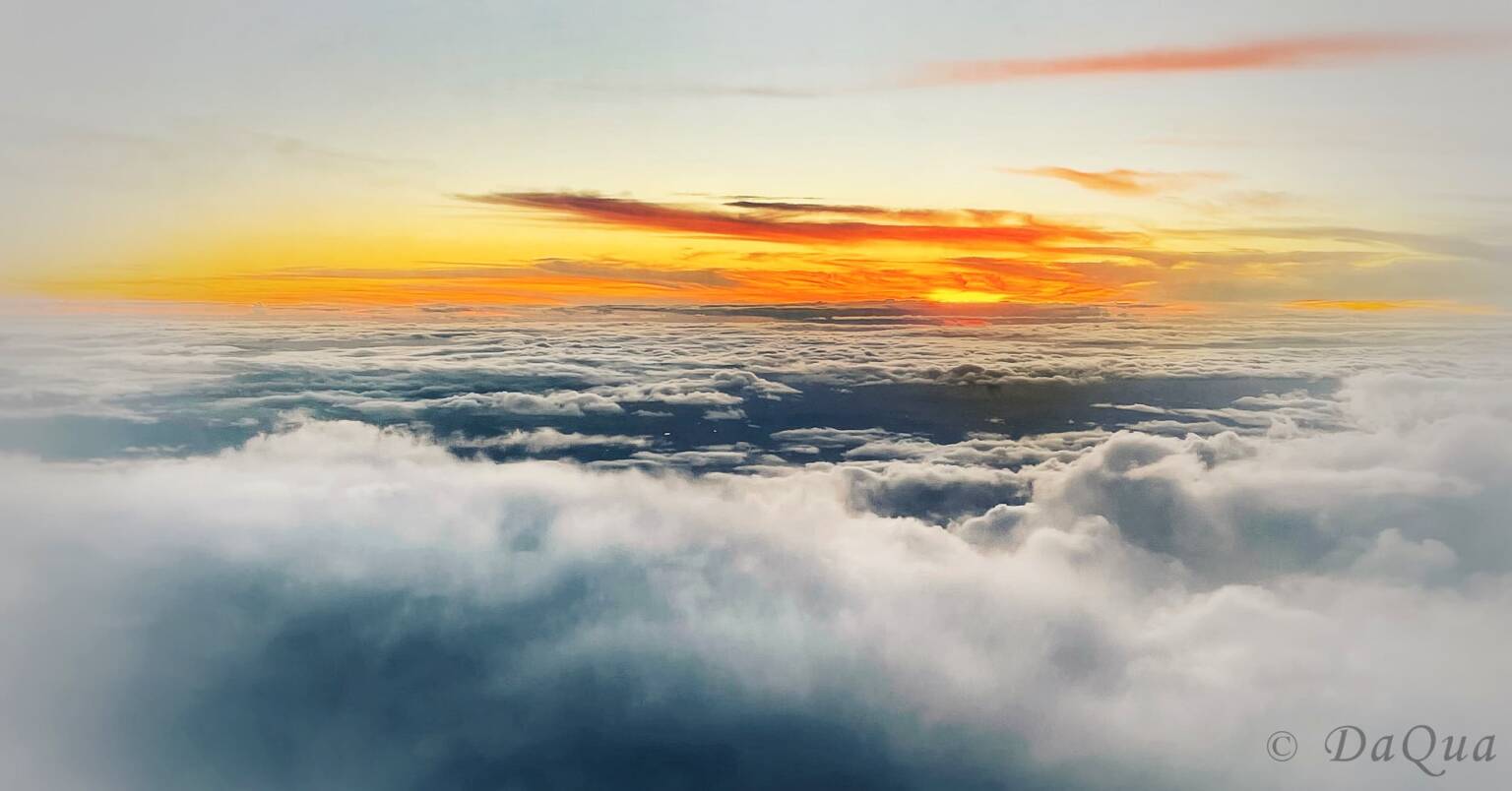Aerial sunrise above the clouds by Da Qua