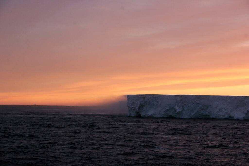 Drygalski Island with the snow blowing and the midnight sun, Antarctica © Jennifer Cooke