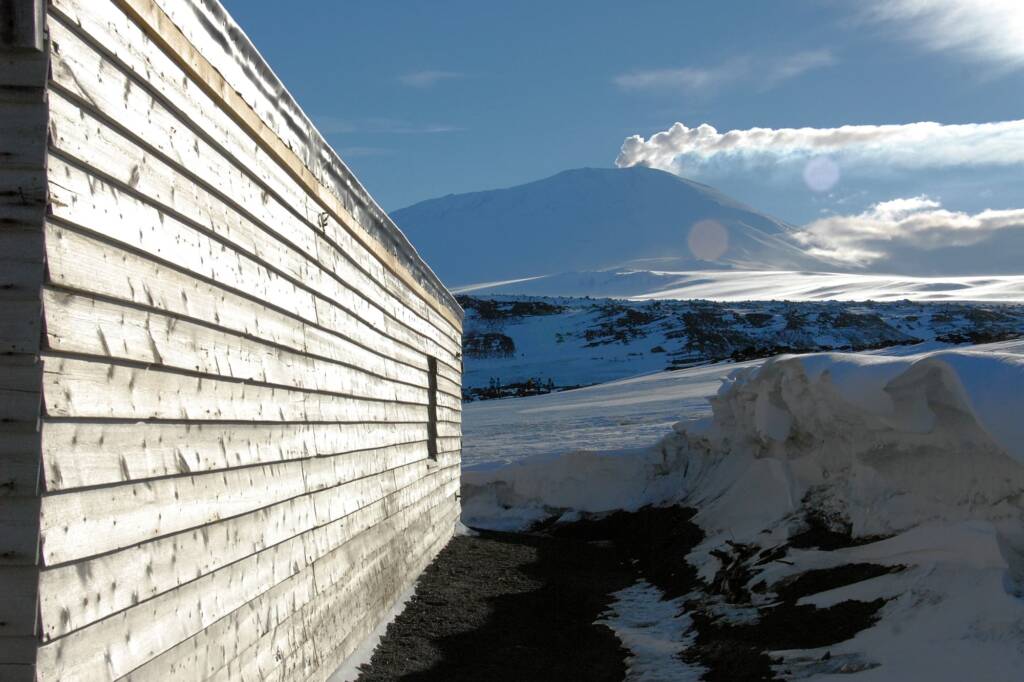 Historic Scott's Hut and Mount Erebus, Antarctica © Jennifer Cooke