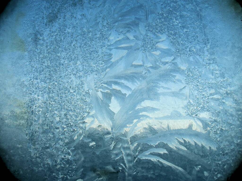 Frozen ice on porthole, Antarctica © Jennifer Cooke
