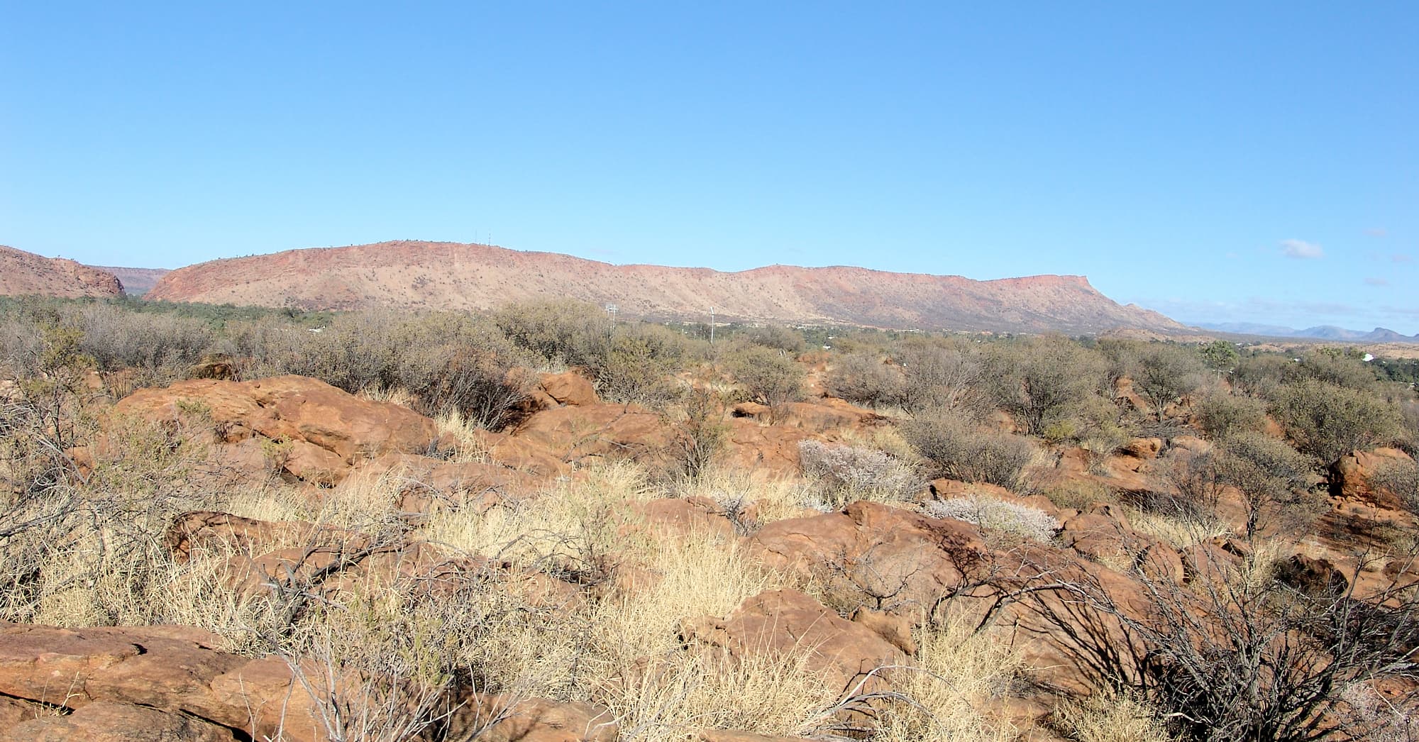 View across to Heavitree Gap, along the range to Mount Gillen, from Meyer Hill in the Olive Pink Botanic Garden.