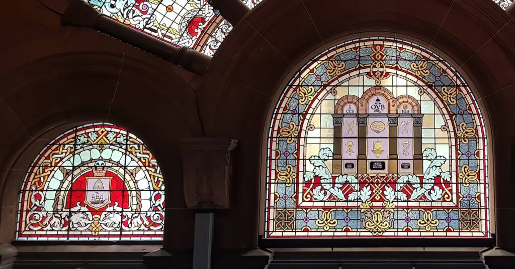 Stained window pane to the left of the main Central window pane of the Cartwheel Window, Queen Victoria Building, Sydney NSW