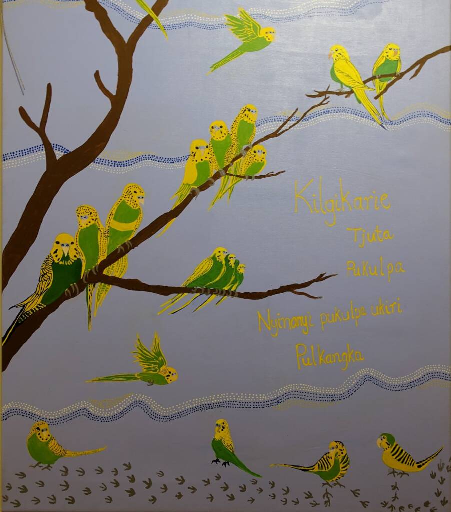 Kilgikarie tjuta pukulpa nyinanyi punu katu - Many Budgerigars Happy Sitting up in the Tree by Collaboration Titjikala (Acrylic on canvas), section Stories, Advocate Art Award 2023
