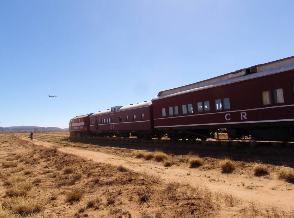 Airplane and Old Ghan Train heading into Alice Springs NT