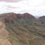 Helicopter ride on a cloudy day over Mount Sonder, West MacDonnell Range