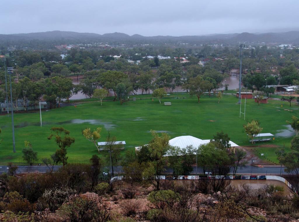 Rain view east over the swollen Todd River, Alice Springs from Anzac Hill, 9 Jan 2010