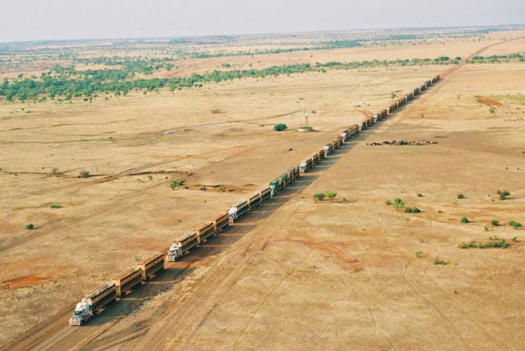 Road Trains (17 in a convoy) at Helen Springs Station, NT © Hans Boessum