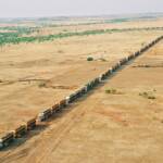 Road Trains (17 in a convoy) at Helen Springs Station, NT © Hans Boessum